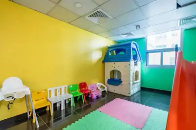 a room with a play room with a play house at Luxury 4 BHK in Dubai Marina DEC 2102 in Dubai