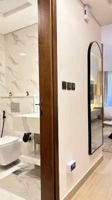 a bathroom with a sink and a mirror at Best Sunrise Holiday Home in Dubai