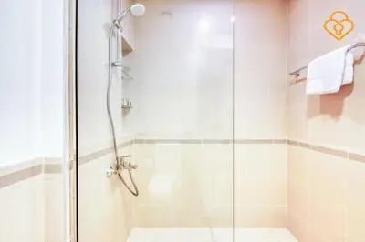 a shower with a glass door in a bathroom at Keysplease Great Family 2 BR Apt, Townsquare in Dubai