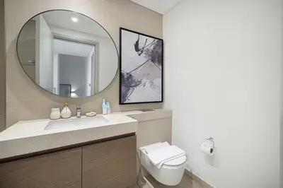 a bathroom with a sink and a mirror at Elegant 4BR Villa, Luxury Pool Retreat, Joy, Arabiana Ranches 3 in Sabkhah