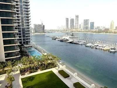 a view of a marina with boats in the water at Palm View Marina Vista 1BR Beachfront in Dubai