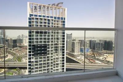 a view of a city skyline from a building at Stylish Damac Prive Studio on hghFlr with Canal View in Dubai