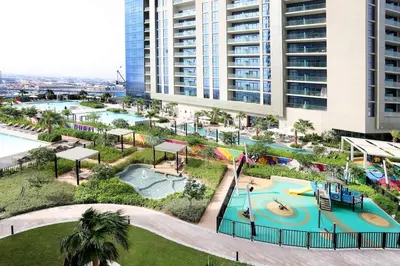 an aerial view of a water park in a city at 2BR I Aykon City I Business Bay I Bshh in Dubai