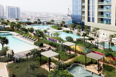 an aerial view of a pool at a resort at 2BR I Aykon City I Business Bay I Bshh in Dubai