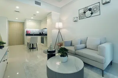 a living room with a couch and a table at 2BR I Aykon City I Business Bay I Bshh in Dubai
