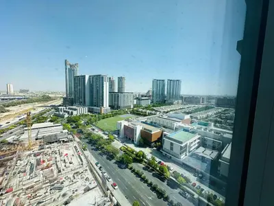 an aerial view of a city with buildings and traffic at Cozy 1br in Sobha Creek Vistas Creek Sea View in Dubai
