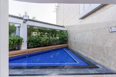 a swimming pool in the side of a building at DAYF-SKG High Floor Studio in Sky Gardens Heart of DIFC in Dubai