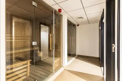 a glass corridor with a toilet in a room at DAYF-SKG High Floor Studio in Sky Gardens Heart of DIFC in Dubai