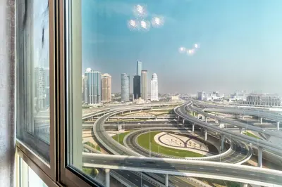 a view of a city from a window at Luxury 1 BHK in Dubai Marina By dPie Man 1710 in Dubai