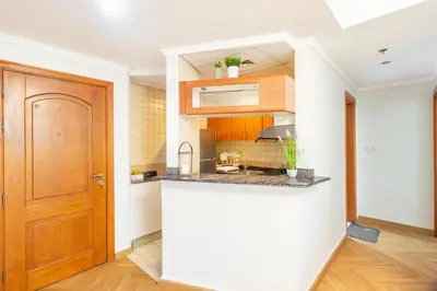 a kitchen with a sink and a counter top at Luxury 1 BHK in Dubai Marina By dPie Man 1710 in Dubai