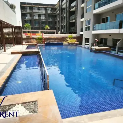 Modern 1BR Apartment with Pool & Gym