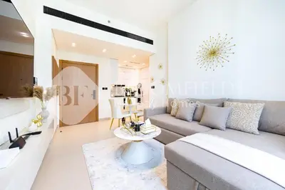 a living room with a couch and a table at Bloomfields Cozy 1Br Binghatti House in Dubai