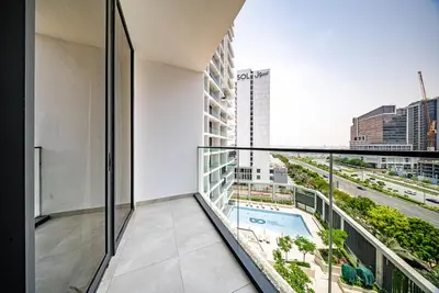 a balcony with a view of a city at Modern Studio I Smart Home I Business Bay in Dubai