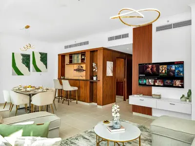 a living room with a couch and a table at Luxury two Bedroom Apartment I Front row Downtown with Private Fountain & Burj View by Luxury Space in Dubai