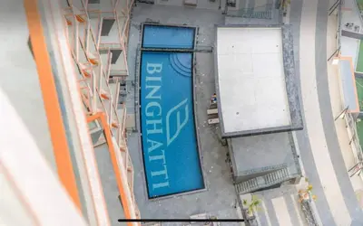 an overhead view of a blue sign on the side of a building at Full Dubai Skyline View on High Floor in Dubai