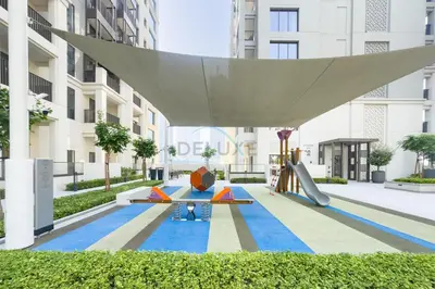 a playground with a slide in a building at Creek Views 1BR, Short Drive to Ras Al Khor Sanctuary and Festival City Mall, Rosewater at Creek Beach Building 3, Dubai Creek Harbour by Deluxe Holiday Homes in Dubai