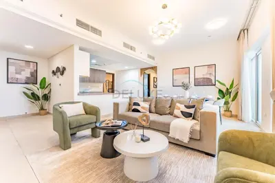 a living room with a couch and chairs at Few Metres Walk to Metro, Minutes Drive from Ibn Battuta Mall, Victoria Residency, Al Furjan by Deluxe Holiday Homes in Dubai
