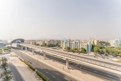an overhead view of a highway in a city at Few Metres Walk to Metro, Minutes Drive from Ibn Battuta Mall, Victoria Residency, Al Furjan by Deluxe Holiday Homes in Dubai