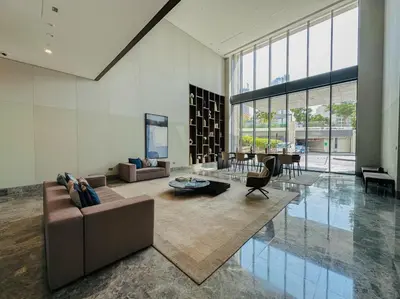 a large living room with a couch and a table at Appealing 1BR at 17 Icon Bay, Dubai Creek Harbour in Dubai