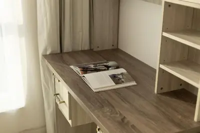 a book sitting on a counter in a room at Luxury 2BHK in Jumeirah Lakes Towers Icon 3502 in Dubai