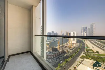 a view of a city from a building at Convertible 1BR with Canal and Skyline View by BMS in Dubai
