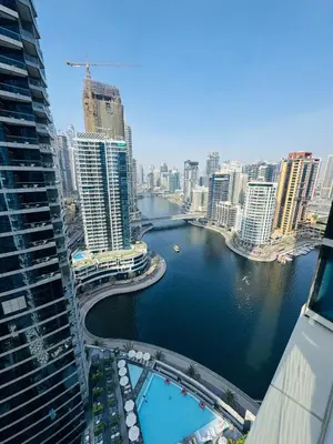 a view of a river in a city with buildings at Bay Central Sea and Canal View, Dubai Marina in Dubai