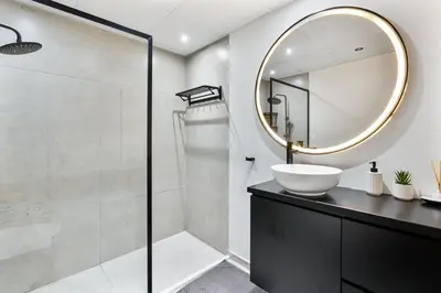 a bathroom with a sink and a mirror at 2BR with Marina Views - Near JBR Beach & Dubai Eye in Dubai