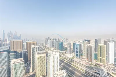 an aerial view of a city with tall buildings at High Rise Apartment with Direct Access to Marina Walk, Near JBR, Marina Mall and Dubai Dining Hotspots, VIDA Residences, Dubai Marina by Deluxe Holiday Homes in Dubai