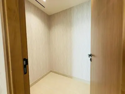 an empty room with a door and a room with a floor at Private Pool II Spacious II Brand New in Dubai