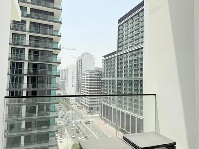 a view of a city from a balcony of a building at Brand New with Installed Private Pool in Balcony in Dubai