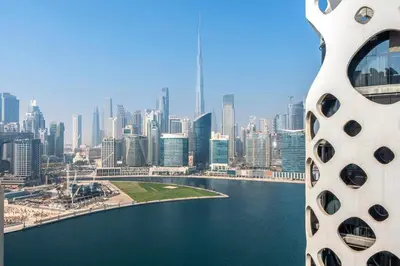 a view of a city with a body of water at Stylish Furnished Apartment with Burj Khalifa View, High Floor in Dubai
