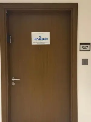 a sign on a door with a sign on it at Giramondo Forte Tower 1 in Dubai