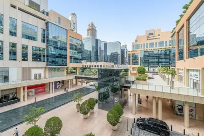 an overhead view of a shopping mall with buildings at Dubai 1BR City Views, Near Downtown Dining, Culture & Attractions in Dubai