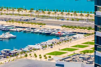 an aerial view of a marina with boats in the water at Royal Oceanic Elegant 2BR with Marina View in Dubai