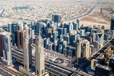 an aerial view of a city with tall buildings at Nice Looking Partition Room Barsha Heights Tecom in Dubai