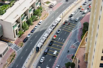 an aerial view of a busy city street with cars at Upgraded 1BHK with Stunning Marina Views in Dubai