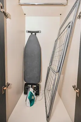 a bathroom with a toilet in a room at Enjoy Modern Comforts with Views of Burj Al Aráb and Nearby Attractions in Dubai