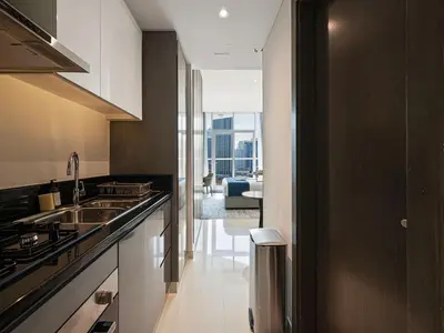 a kitchen with a sink and a counter top at Livin' Holidays - Studio - Close to downtown in Dubai