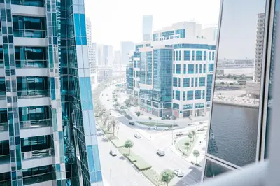 a view of a city street from a skyscraper at Luxury Studio l Rooftop Pool & Gym Access in Dubai