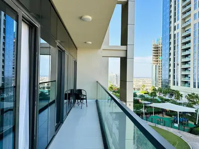 a balcony of a building with a view of the city at Cozy Haven High Rise Balcony and Upscale Furnished in Dubai