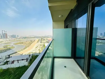 a view from the balcony of a building at Sleek Charm Inviting Atmosphere and Cozy Balcony in Dubai
