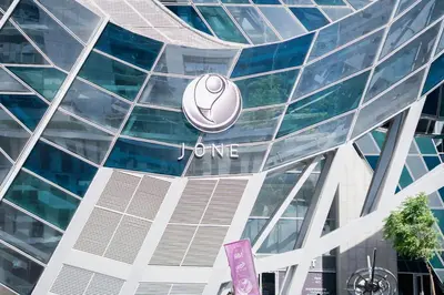 a logo on the side of a building at Chic Business Bay Retreat l Pool, Luxury Amenities in Dubai