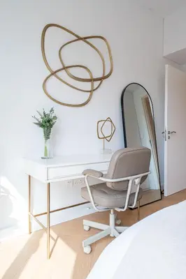 a bedroom with a desk and a chair and a mirror at Modern 1BR Steps from Burj AlArab Madinat Jumeirah By AYA Boutique in Dubai