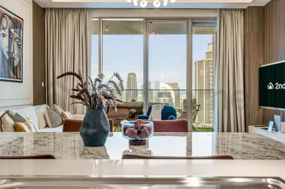 a living room with a view of a living room at Burj Khalifa view, 3 Bedroom, Maids Room, Forte in Dubai