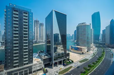a view of a city with tall buildings and a freeway at Family-Friendly 4BR with Amenities Business Bay in Dubai