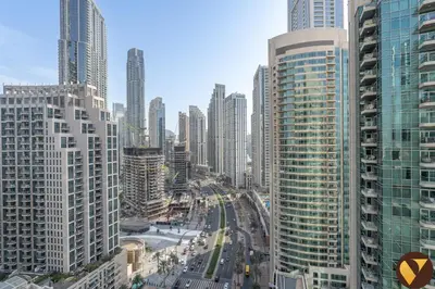 a view of a city with many tall buildings at Vogue Downtown The Lofts near Burj Khalifa and Dubai Mall, Two Bedroom Apartment with Balcony and City Skyline View, Access to all Amenities in Dubai