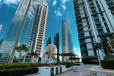 a view of a city skyline with tall buildings at Mahogany 16 - 1BR 4 Guests - Walk to Burj Khalifa in Dubai