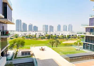a view of the city from a building at Chic 2BR in Damac Hills with Golf & Pool View in Dubai