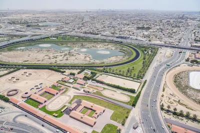 an aerial view of a city with roads and buildings at Luxury 2BR with Burj and Ocean Views in Dubai