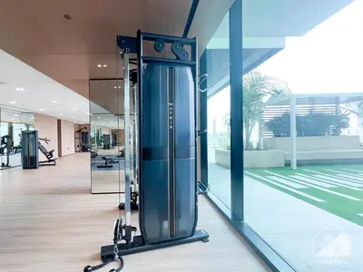 a gym with exercise equipment in a building at Luxury & Comfort 1B at Binghatti Amber & Balcony in Dubai